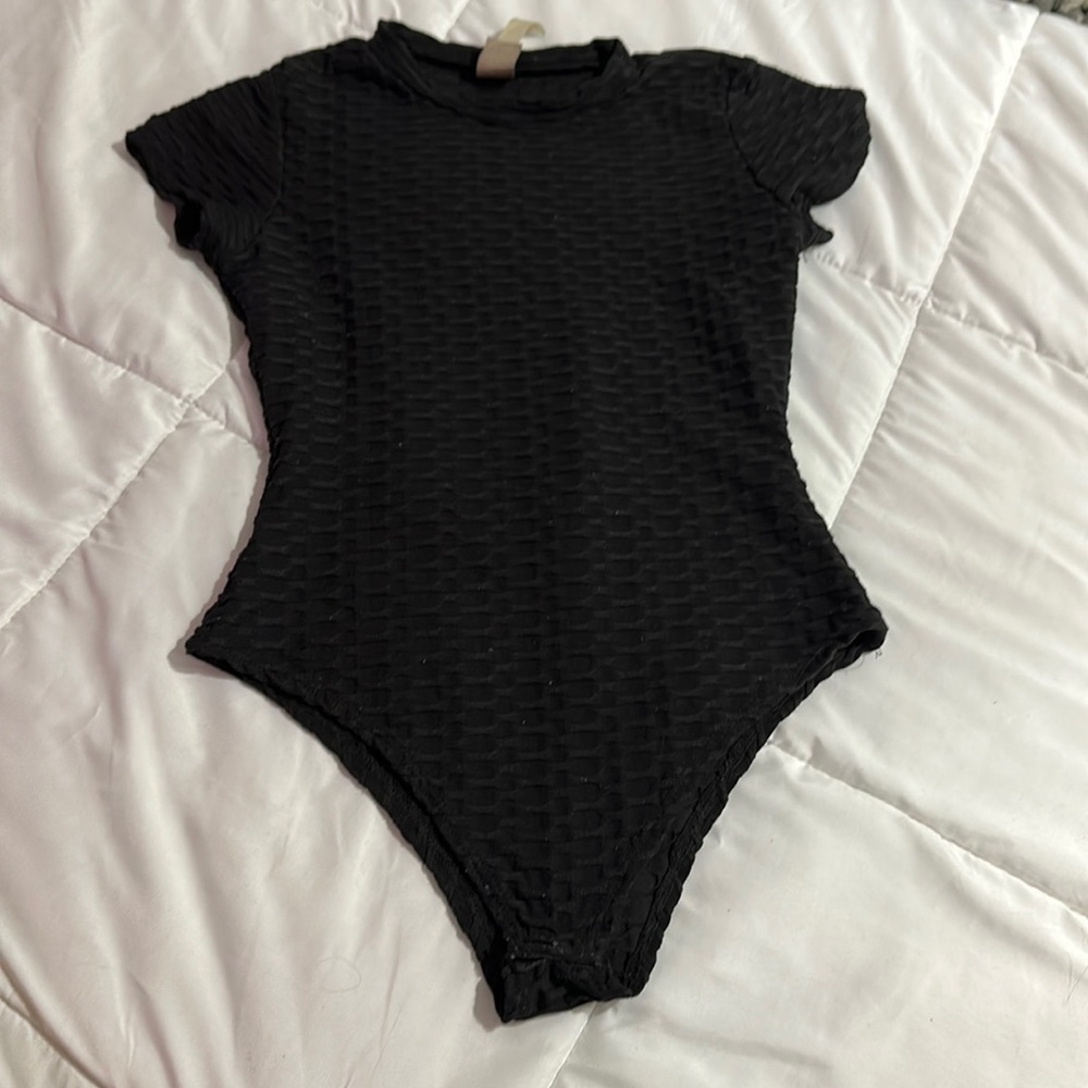 Black bodysuit textured like the “tiktok leggings”
